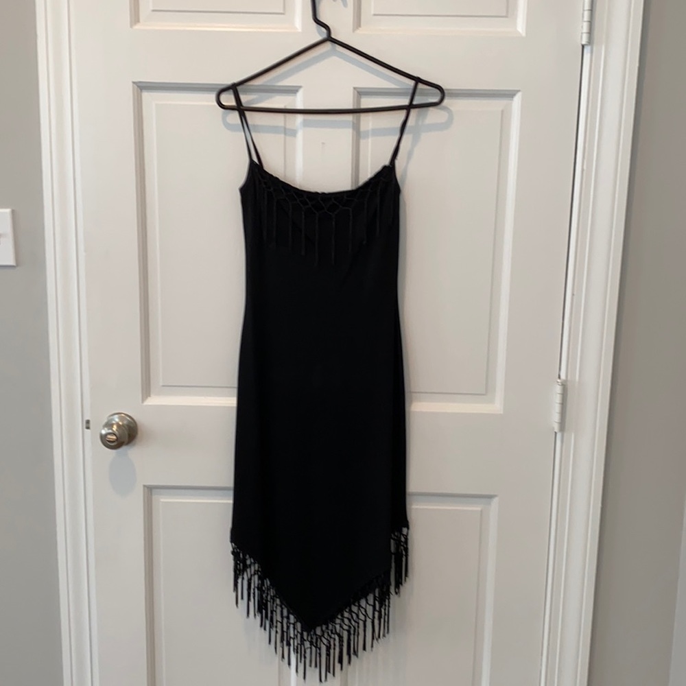 Sexy and chic black dress with tassel detail
